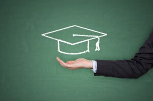 A,Hand,Holding,A,Graduation,Hat